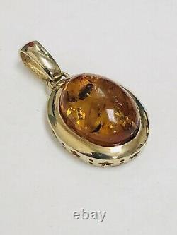 10k Solid Yellow Gold 16 mm Oval Baltic Amber Pendant 1.25