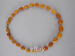 ANTIQUE NATURAL BALTIC AMBER NECKLACE 21.4g EGG YOLK YELLOW OVAL BEADS