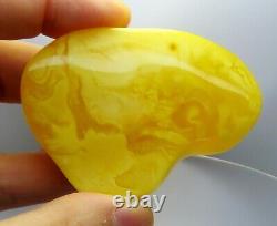 Amazing 59.50 grams polished Yellow Egg Yolk Genuine BALTIC AMBER stone