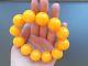 Baltic Amber bracelet, round beads 20mm 59.51 grams butterscotch color AA00