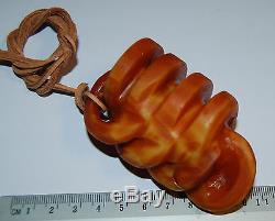 Natural Baltic Amber. Ancient Pagan amulet. Red/Butterscotch color. 63 gr (a219)