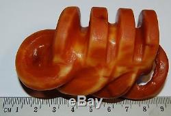 Natural Baltic Amber. Ancient Pagan amulet. Red/Butterscotch color. 63 gr (a219)