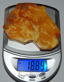 Natural Baltic Amber. Figure. Egg Yolk/Brindled color. 18,9 g (a566)