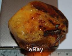 Natural Baltic Amber Stone. Egg Yolk/Brindled/Cognac color. 77,5 g (a374)