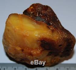 Natural Baltic Amber Stone. Egg Yolk/Brindled/Cognac color. 77,5 g (a374)