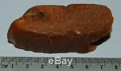 Natural Baltic Amber Stone. Egg Yolk/Brindled color. 38,8 g (a1163)