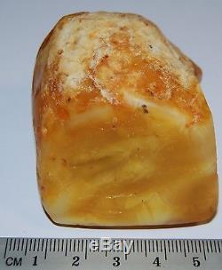 Natural Baltic Amber Stone. Egg Yolk/Brindled color. 60 gr (a443)