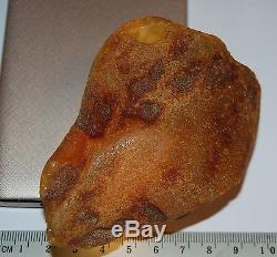 Natural Baltic Amber Stone. Egg Yolk/Brindled color. 99 g (a364)
