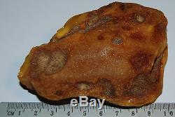 Natural Baltic Amber Stone. Egg Yolk/Brindled color. 99 g (a364)