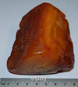 Natural Baltic Amber Stone. Egg Yolk/Buttescotch/Brindled color. 133 g (a442)