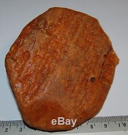 Natural Baltic Amber Stone. EggYolk/Butterscotch color. 128,5 gr (A015)