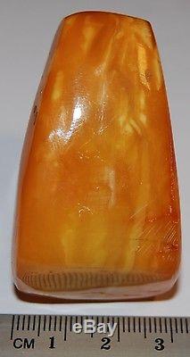 Natural Baltic Amber. Stone/Figure. Egg Yolk/Brindled color. 47 g (a441)