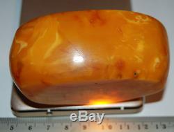 Natural Baltic Amber Stone. Red/Brindled/Butterscotch color. 111 g (a234)
