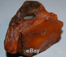 Natural Baltic Amber Stone. Red/Butterscotch color. 76 gr (a430)