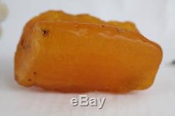 Raw amber stone 336.2g eggyolk beeswax 100% natural Baltic