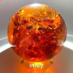 Spectacular Baltic amber ball with honey bees, ø ±93 mm ±530 grams