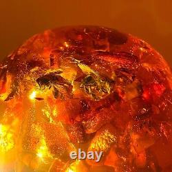 Spectacular Baltic amber ball with honey bees, ø ±93 mm ±530 grams