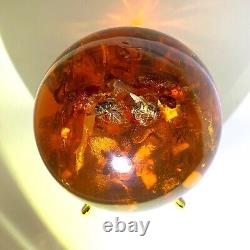 Spectacular Baltic amber ball with honey bees, ø ±93 mm ±530 grams