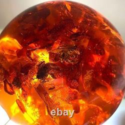 Spectacular Baltic amber ball with honey bees, ø ±93 mm ±530 grams